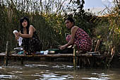 Inle Lake Myanmar. All the buildings are constructed on piles. Residents travel around by canoe, but there are also bamboo walkways and bridges over the canals, monasteries and stupas. 